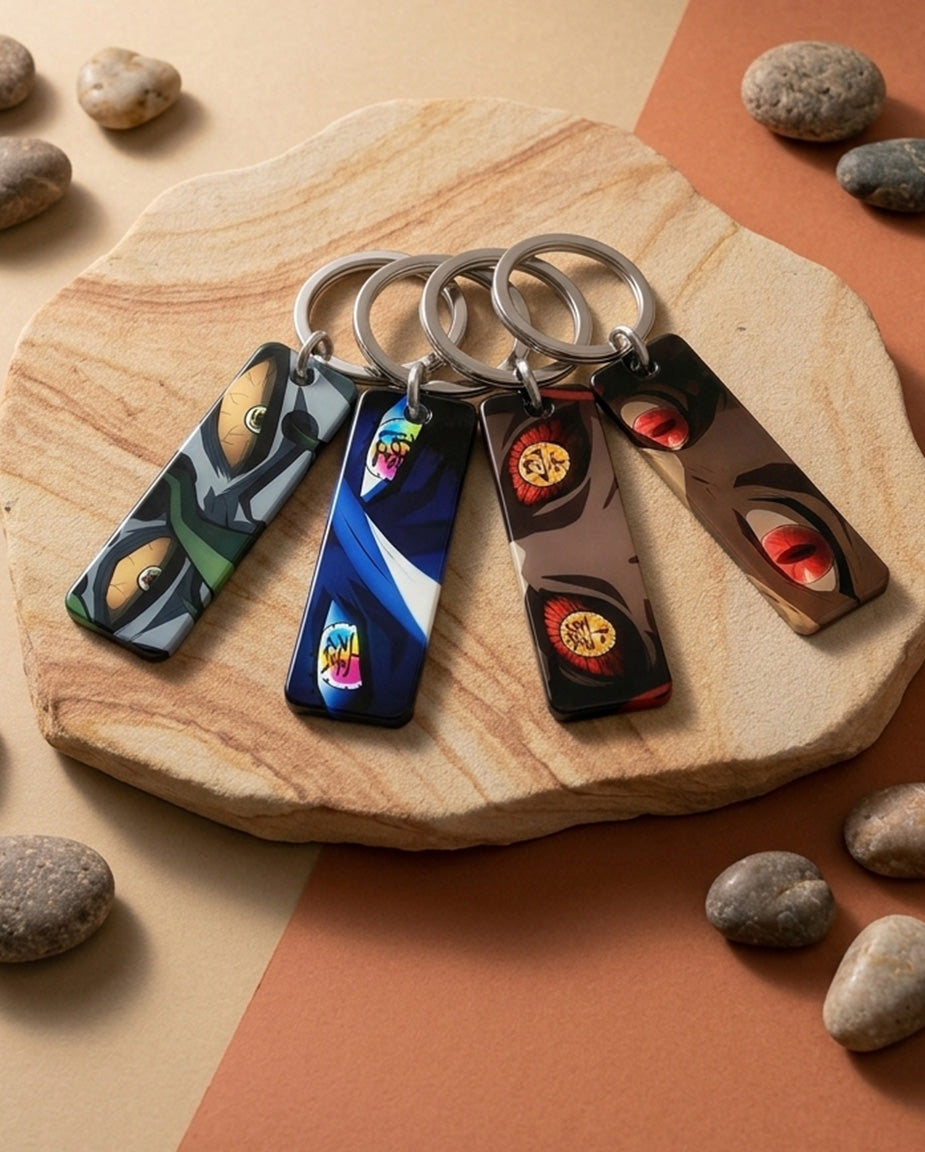 Demon Slayer Upper Moons Keychain Bundle — Muzan + Kokushibo + Doma + Gyutaro